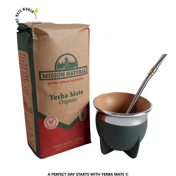 Picture shows a "torpedo" style olive green mate cup with stainless steel bombilla. It also features an organic certified yerba mate bag "Mision Natural"